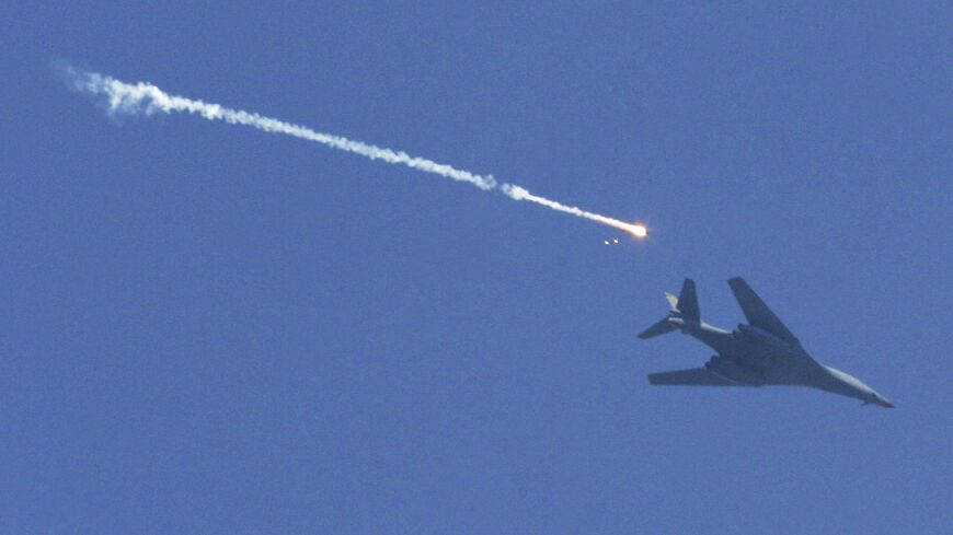 A US Air Force B-1 Bomber fires flares while providing air support for a US Army recon mission Oct. 27, 2006 in the Paktika province of Afghanistan near the Pakistan border.  